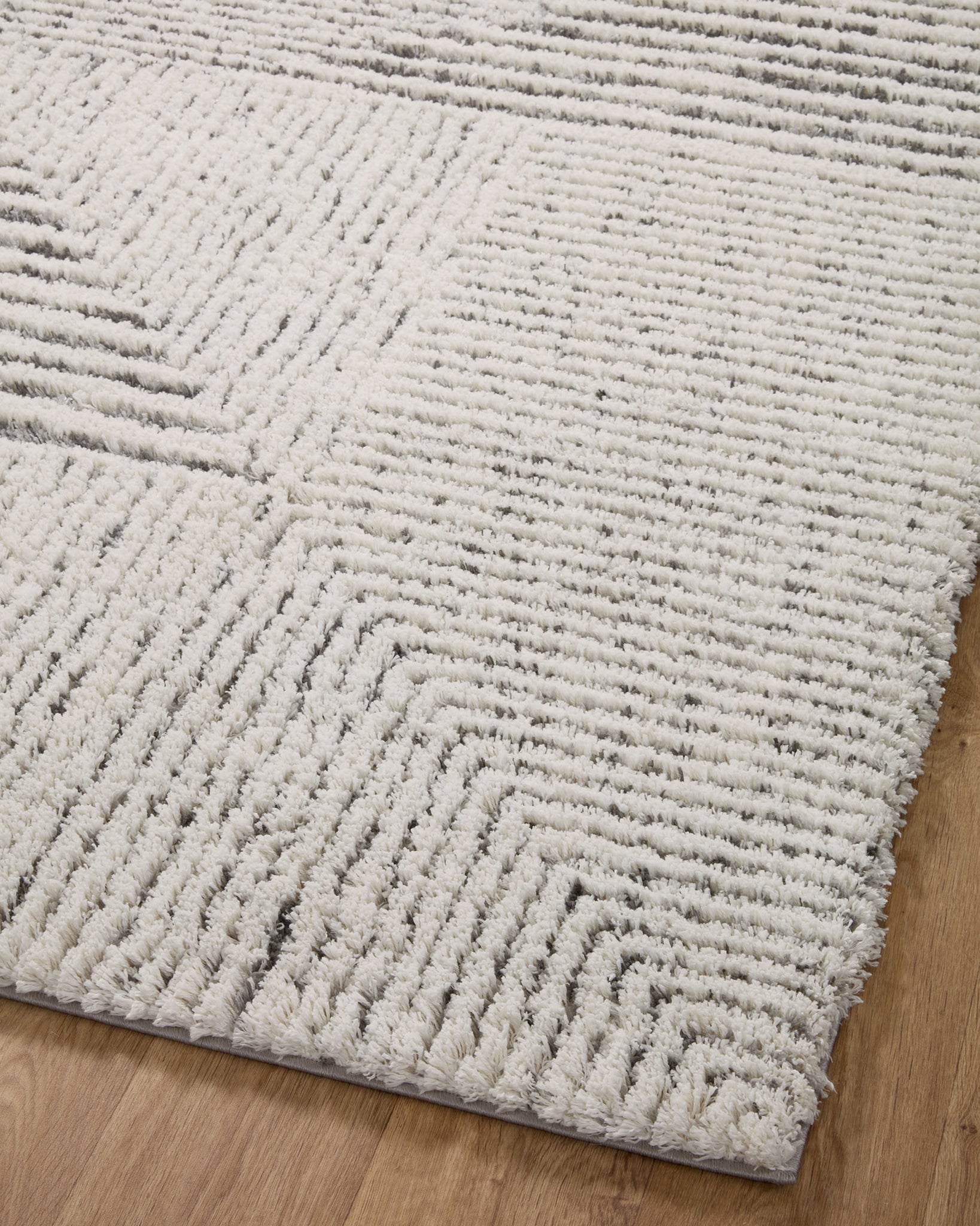 Levitt Shag Ivory / Grey shown from another angle.