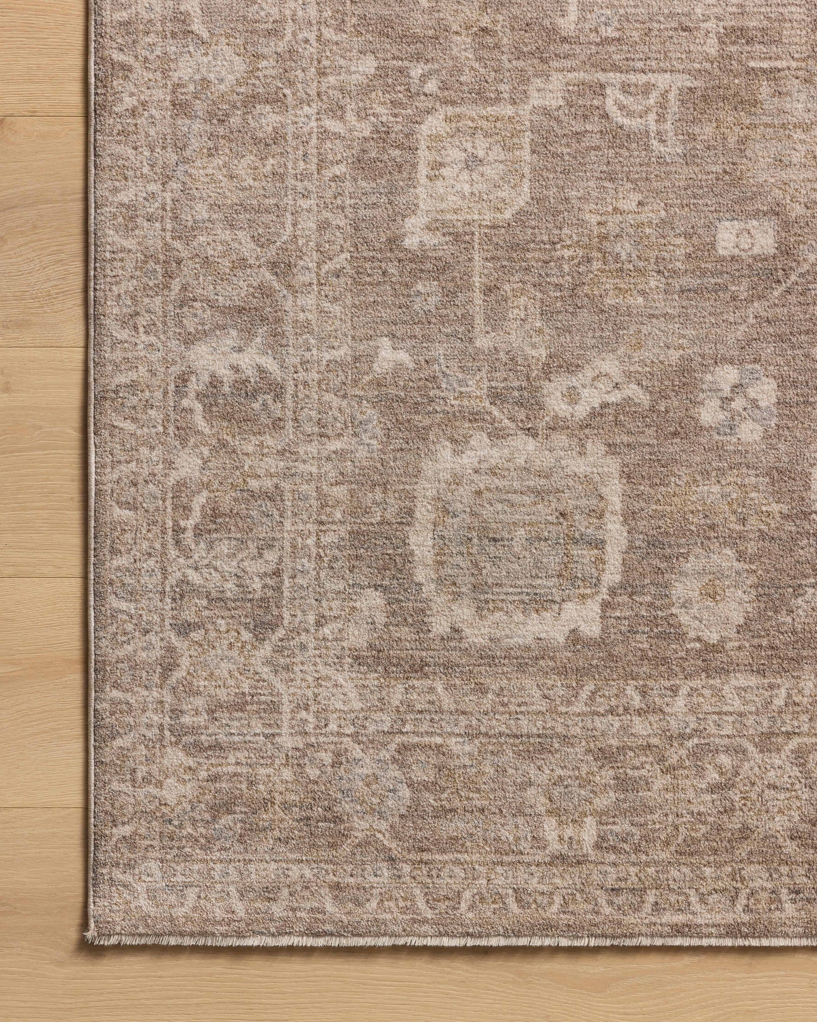 Louisa Taupe / Ivory shown from a different angle to reveal its pattern.