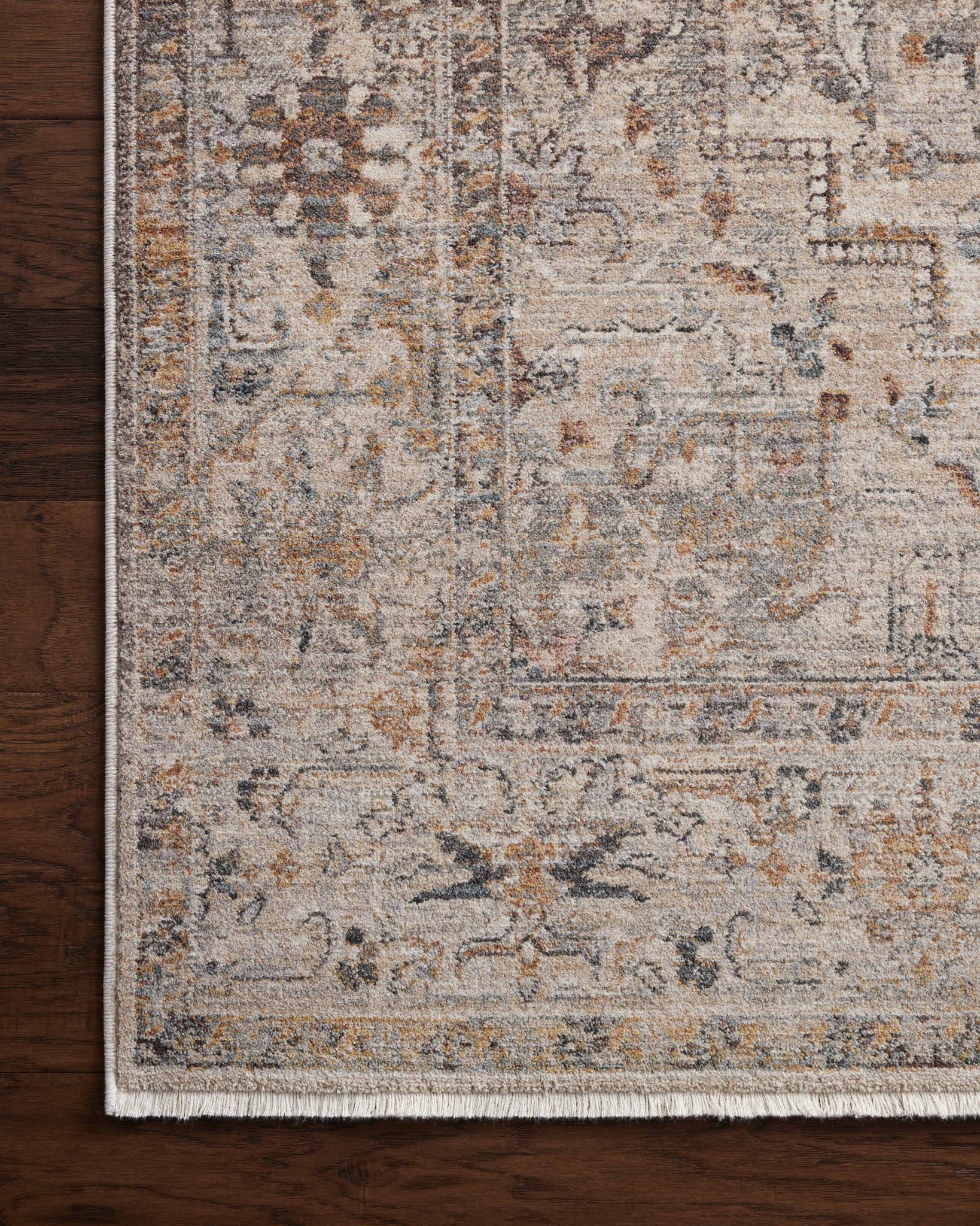 Side view of the Lyra Natural / Gold rug.