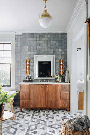 Lambert Pendant 12.5" in aged brass styled in a welcoming entryway for warm, layered light at Laurie Yapp Home.