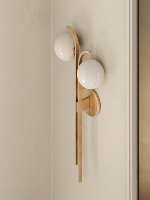Close-up of the Laval Wall Sconce 10.5" in aged brass showing the arm curve and shade silhouette.
