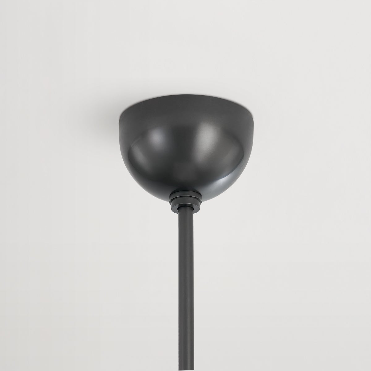 Close-up of the Lethbridge Pendant 15" in bronze showing the shade shape and metal detail.