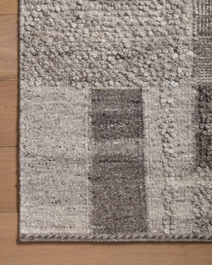 Manfred Charcoal / Dove shown in a styled living room vignette at Laurie Yapp Home.