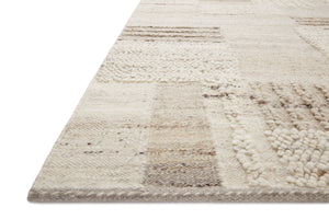 Side view of the Manfred Natural / Stone rug.