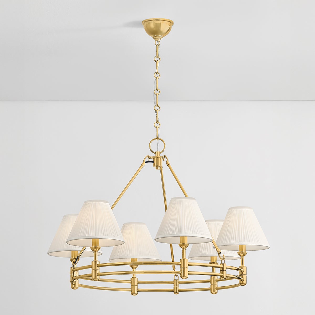 Close-up of the Howard Chandelier 32.75" x 23" in aged brass showing the frame, arms, and shade detail.