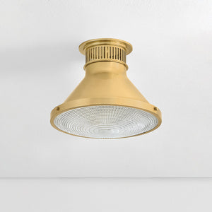 Close-up of the Highclere Flush Mount 12.75" in aged brass showing the shade profile and mounting canopy.