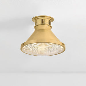Close-up of the Highclere Flush Mount 12.75" in aged brass showing the shade profile and mounting canopy.