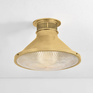 Close-up of the Highclere Flush Mount 17.75" in aged brass showing the shade profile and mounting canopy.