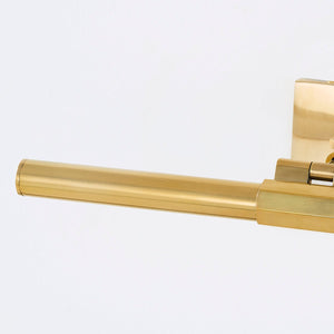 Close-up of the Melbourne Picture Light 16" in aged brass showing the arm curve and shade proportion.