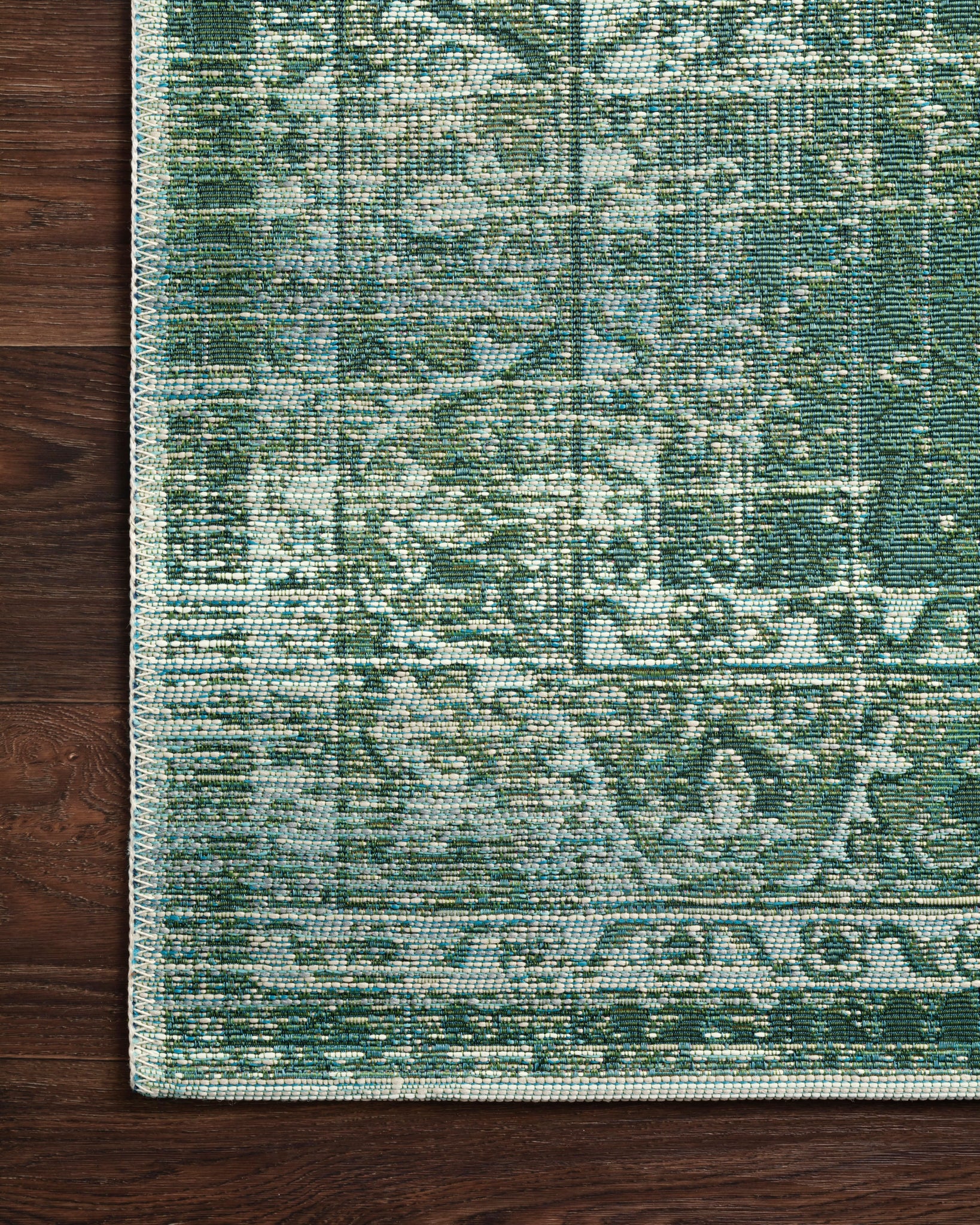 Close-up detail of the Mika Green / Mist showing its pile and weave.