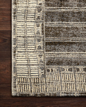 Close-up detail of the Mika Charcoal / Ivory showing its pile and weave.