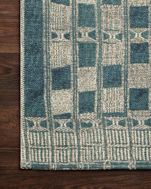 Close-up detail of the Mika Blue / Ivory showing its pile and weave.