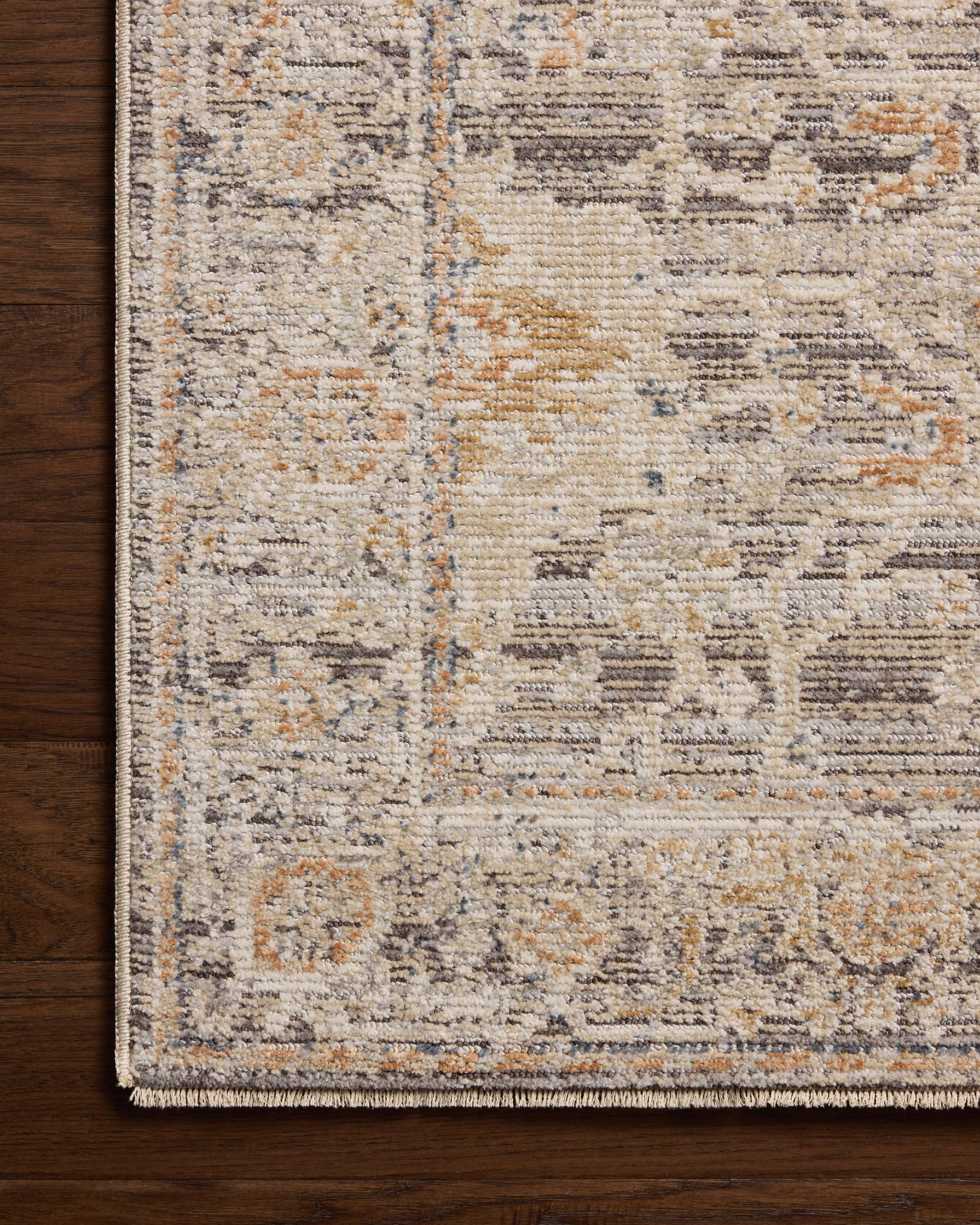 Milena Charcoal / Apricot shown from a different angle to reveal its pattern.