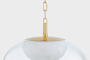 Close-up of the Moore Pendant 17" in aged brass showing the shade shape and metal detail.
