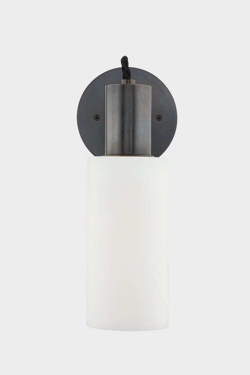 Close-up of the Malba Wall Sconce in dark bronze showing the arm curve and shade silhouette.