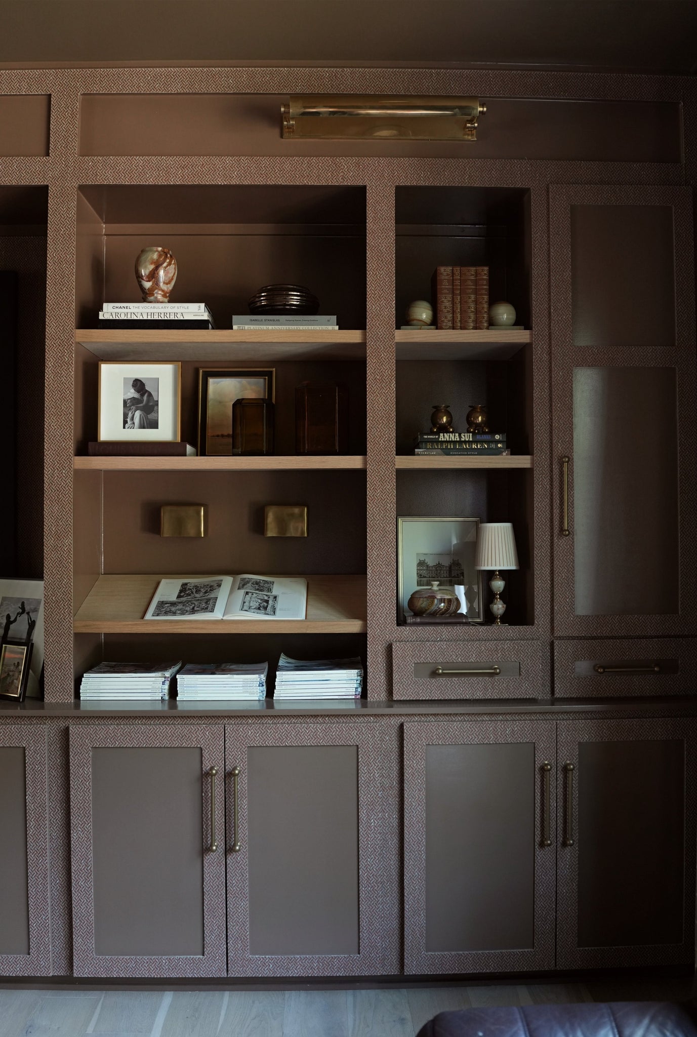 Merrick Picture Light 24.5" in aged brass styled in a gallery wall for warm, layered light at Laurie Yapp Home.