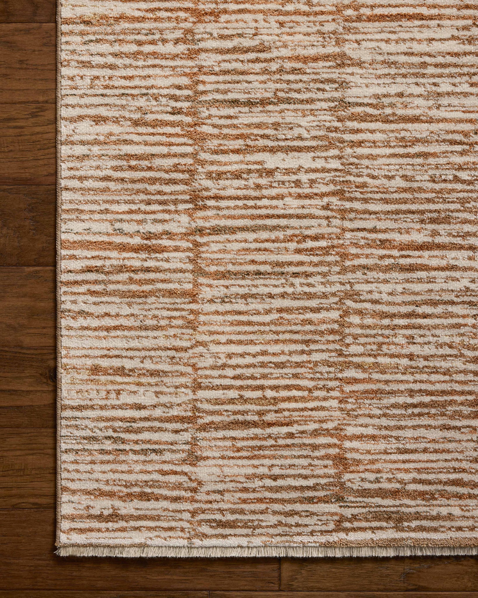 Nellie Terracotta / Ivory shown from a different angle to reveal its pattern.