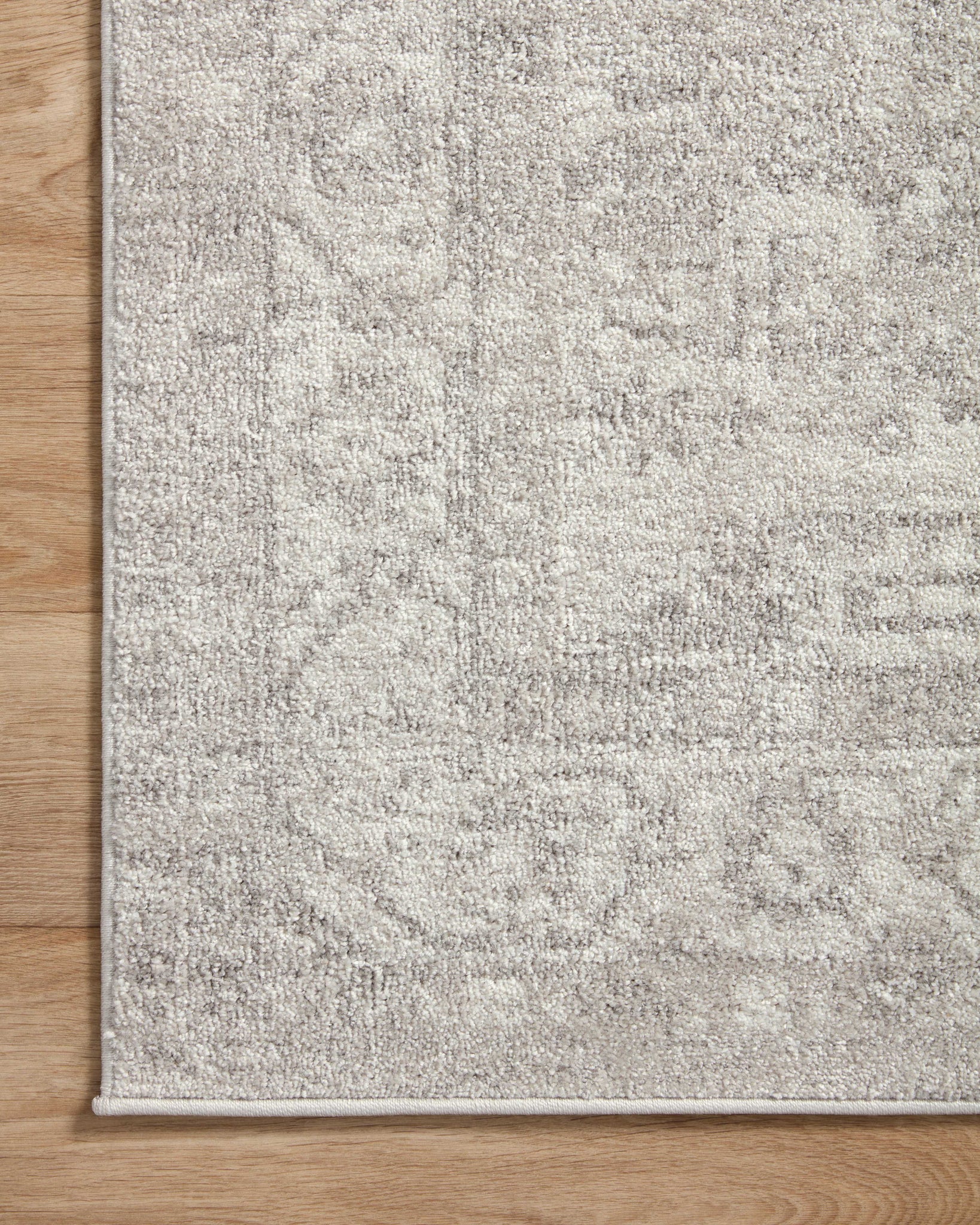 Odette Silver / Ivory shown from a different angle to reveal its pattern.