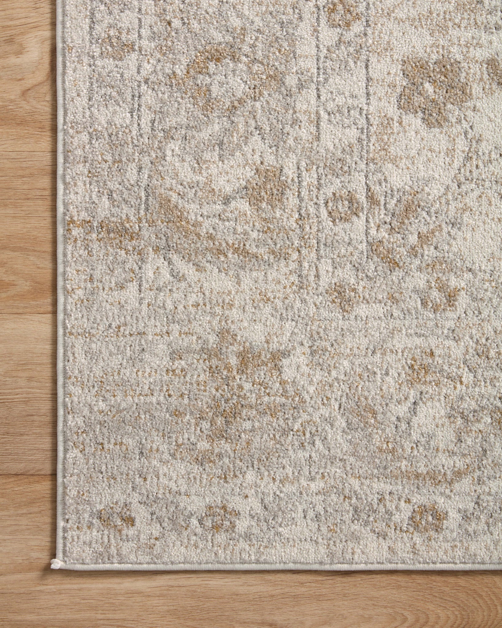 Odette Ivory / Beige shown from a different angle to reveal its pattern.