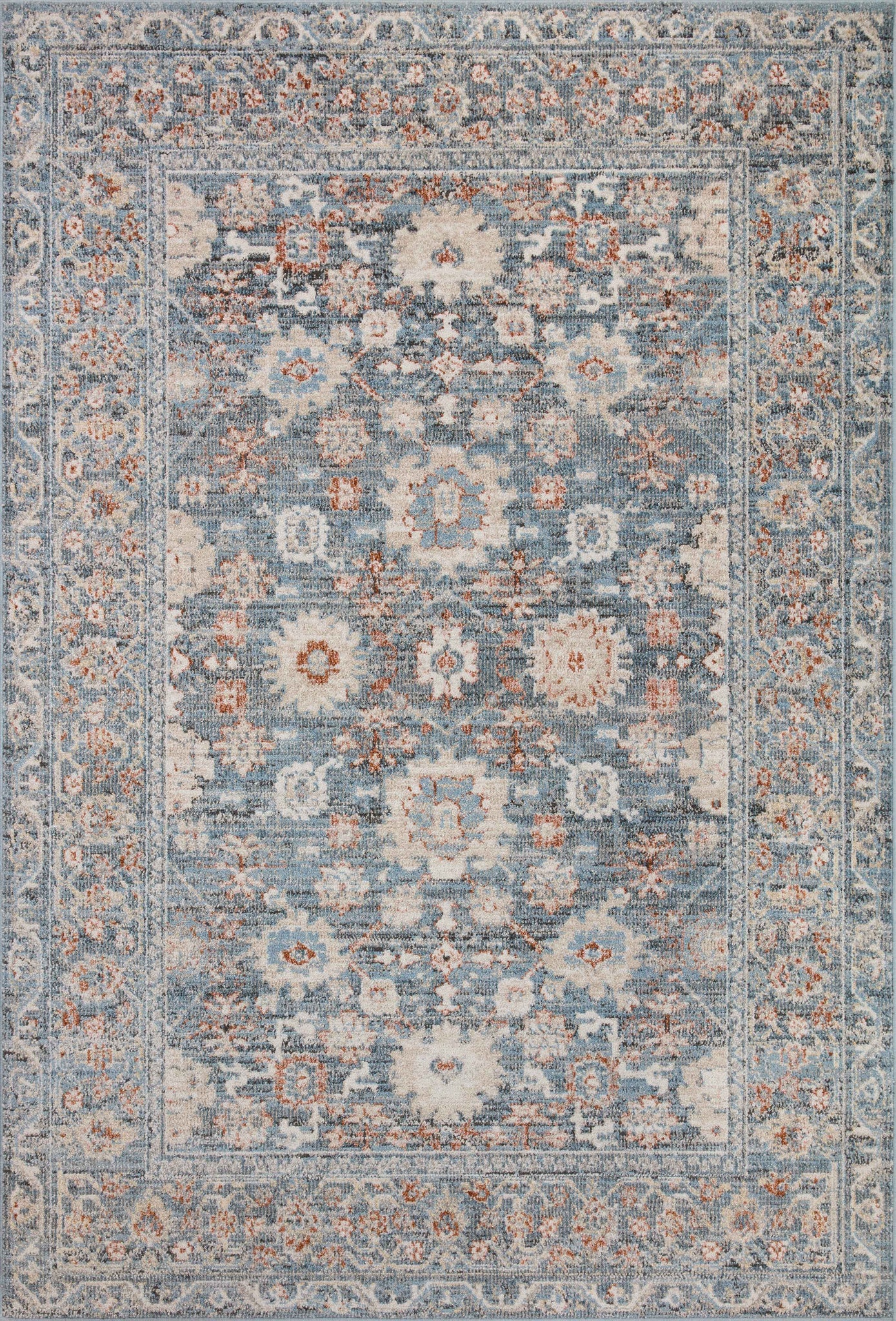 Odette Sky / Rust — a Loloi rug at Laurie Yapp Home.