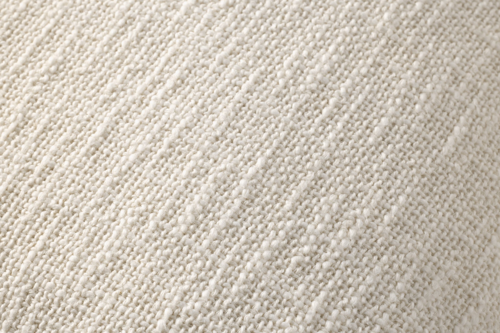 Ivory Pillow shown from a different angle to reveal its pattern.