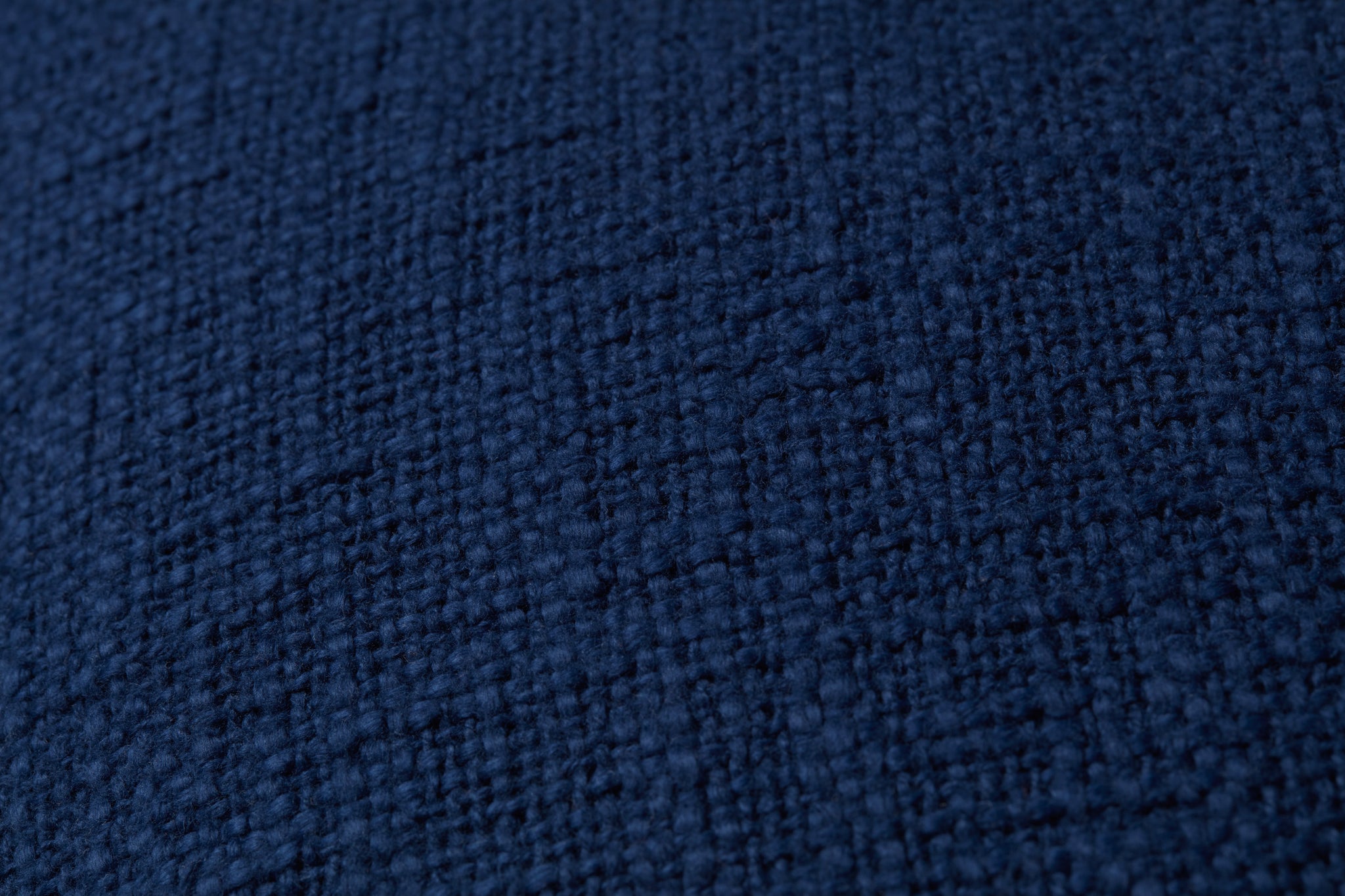 Navy Pillow shown from a different angle to reveal its pattern.