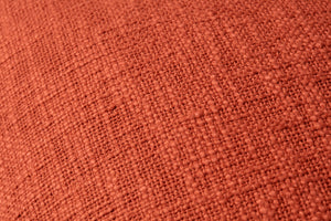 Orange Pillow shown from a different angle to reveal its pattern.