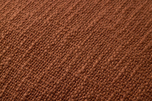 Terracotta Pillow shown from a different angle to reveal its pattern.