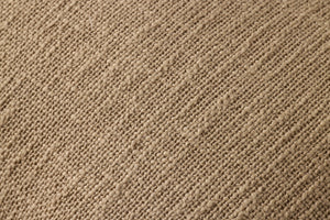 Tan Pillow (Pattern 1) shown from a different angle to reveal its pattern.