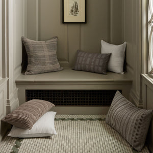 Julia Ivory Pillow shown from a different angle to reveal its pattern.