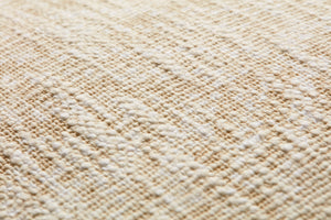 Ivory Pillow (Pattern 3) shown from a different angle to reveal its pattern.