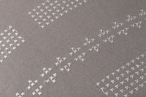 William Grey Pillow shown from a different angle to reveal its pattern.