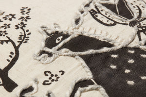 Ivory / Black Pillow shown from a different angle to reveal its pattern.