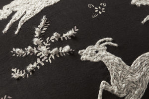 Black / Ivory Pillow (Pattern 2) shown from a different angle to reveal its pattern.