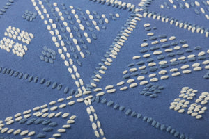 Blue / Ivory Pillow (Pattern 2) shown from a different angle to reveal its pattern.