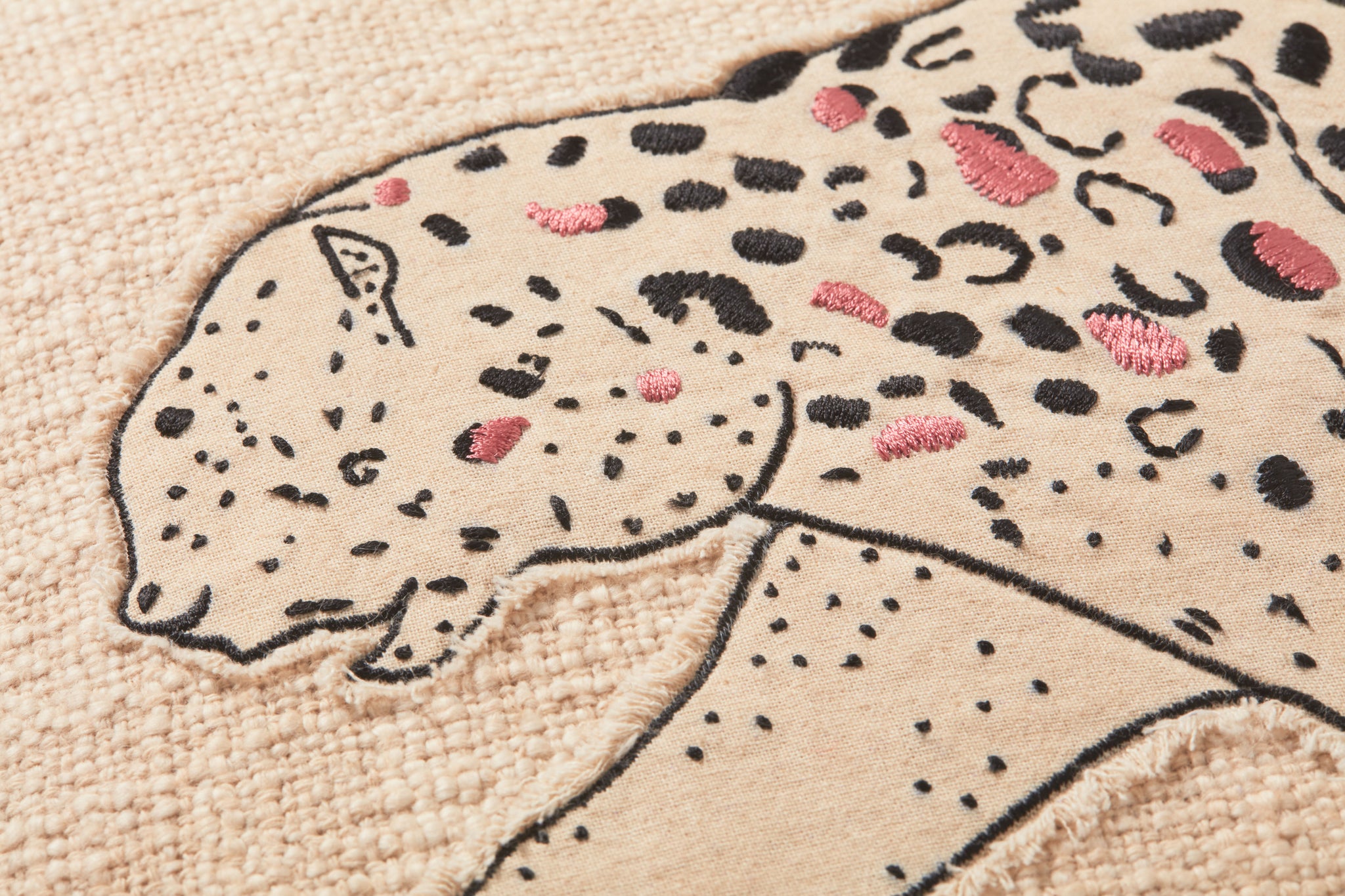 Ivory / Black Pillow (Pattern 1) shown from a different angle to reveal its pattern.