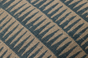 Natural / Blue Pillow shown from a different angle to reveal its pattern.