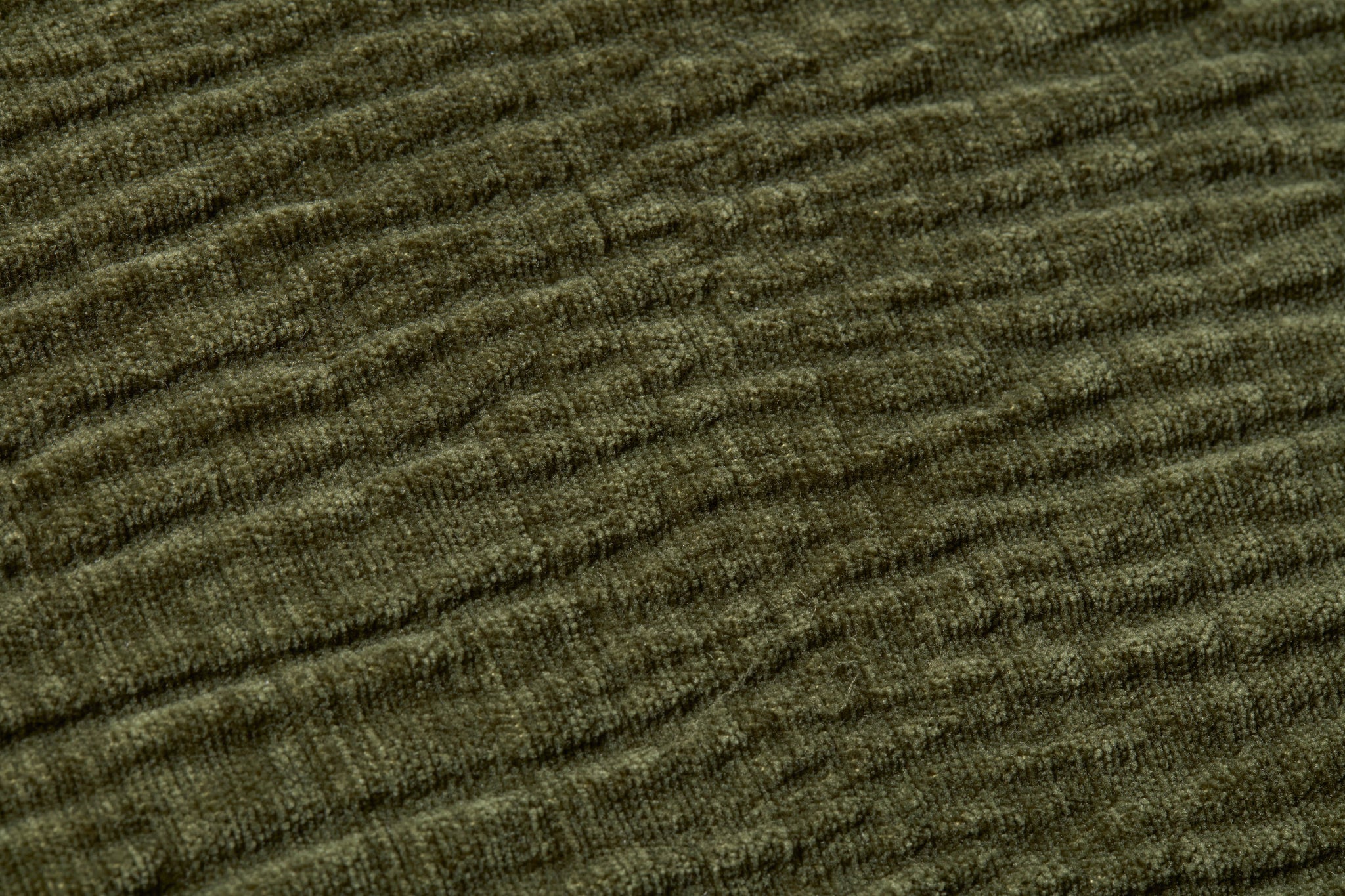Olive Pillow (Pattern 1) shown from a different angle to reveal its pattern.