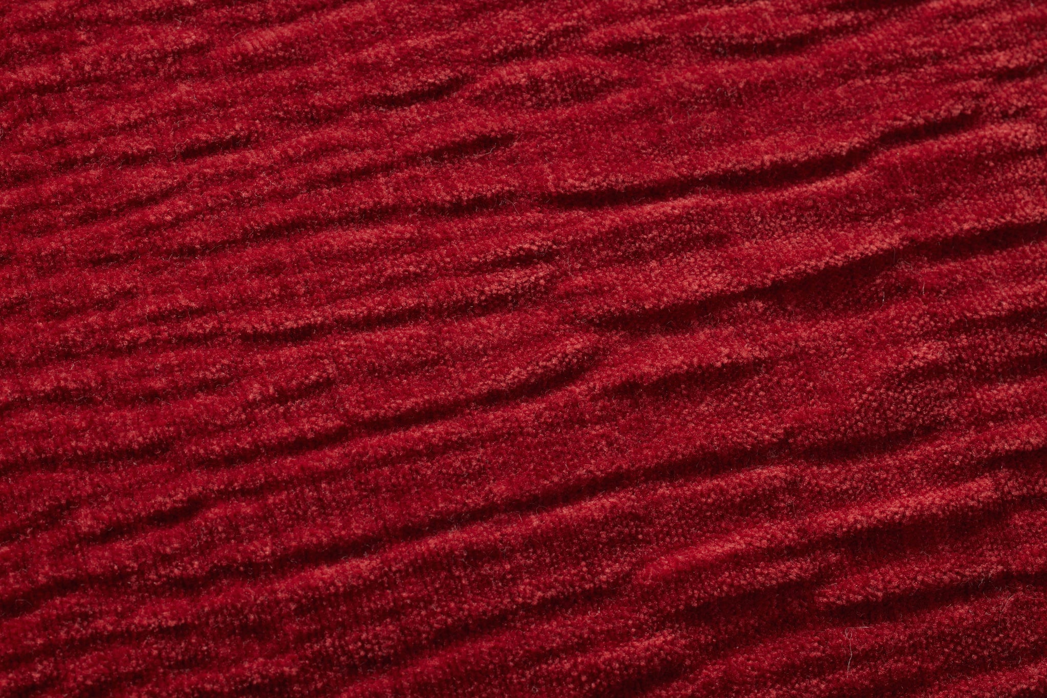 Red Pillow (Pattern 2) shown from a different angle to reveal its pattern.