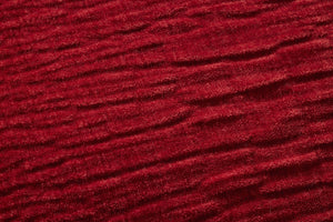 Red Pillow (Pattern 2) shown from a different angle to reveal its pattern.