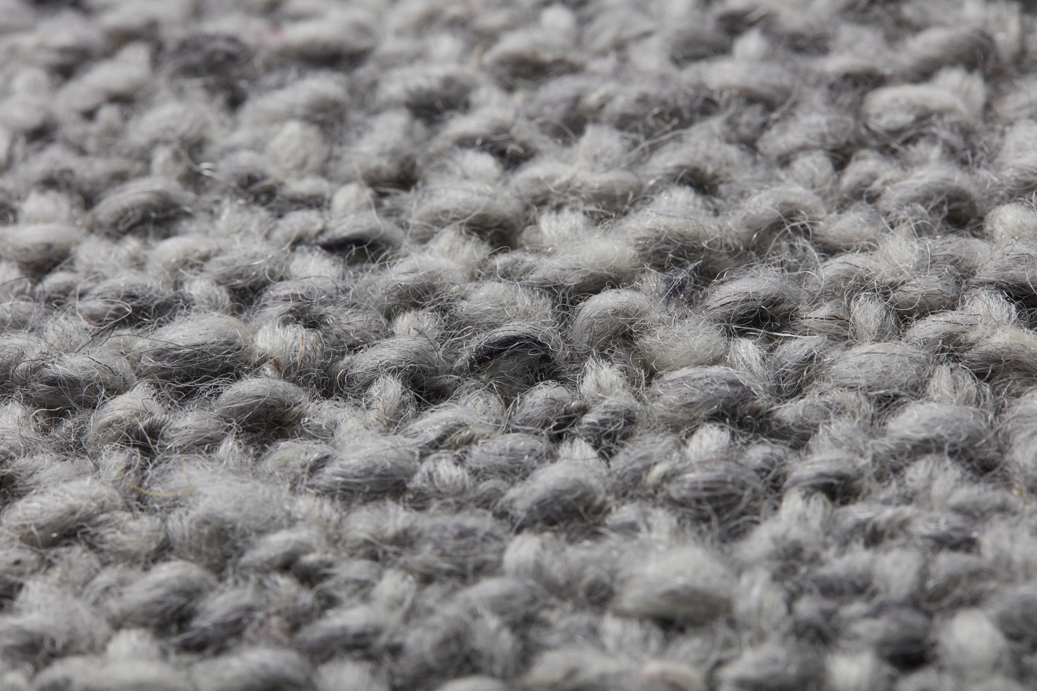 Lt Grey Pillow shown from a different angle to reveal its pattern.