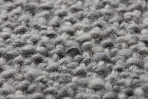 Lt Grey Pillow shown from a different angle to reveal its pattern.