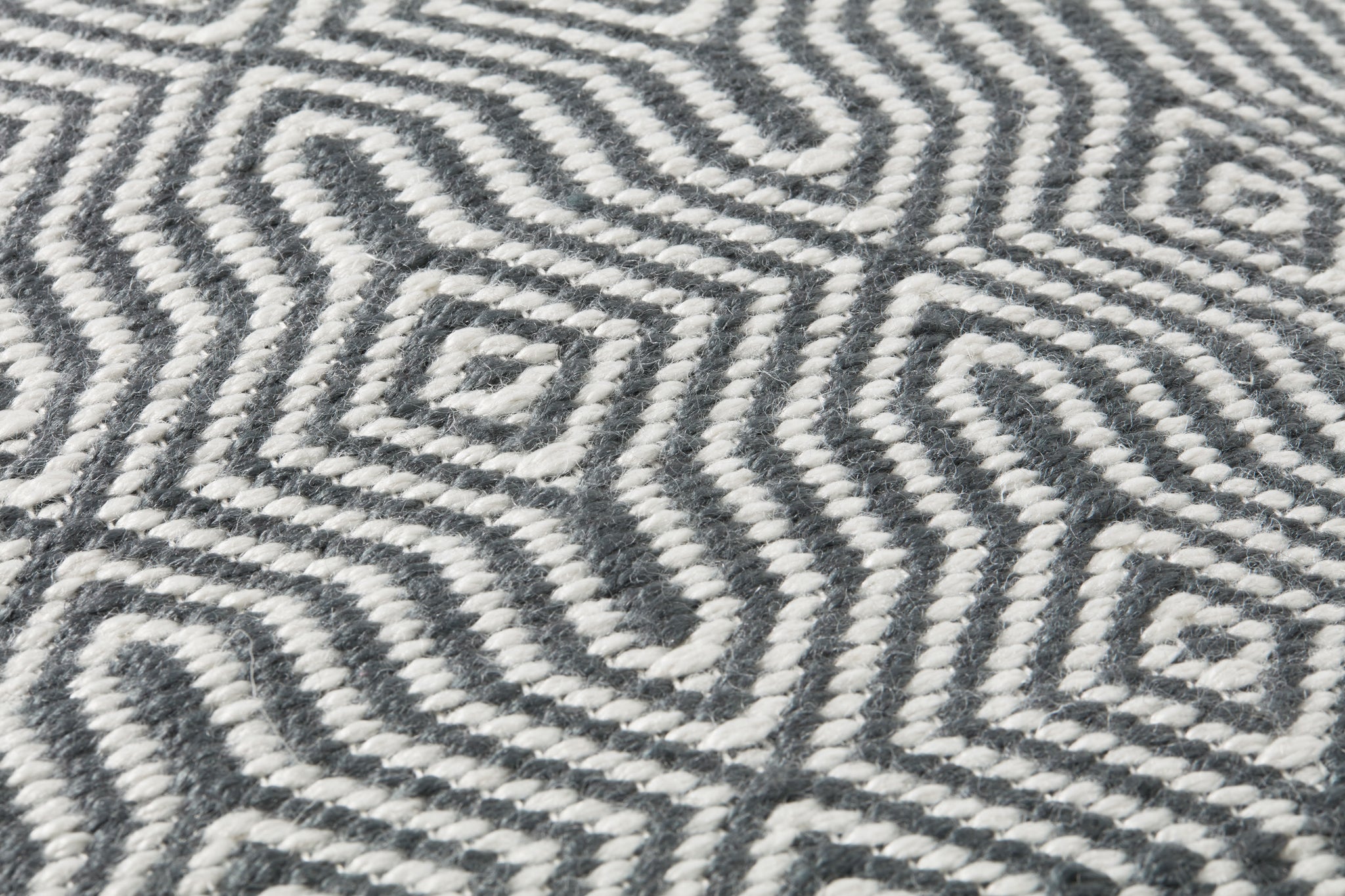 Charcoal / White Pillow shown from a different angle to reveal its pattern.
