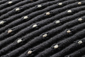 Black Pillow (Pattern 1) shown from a different angle to reveal its pattern.