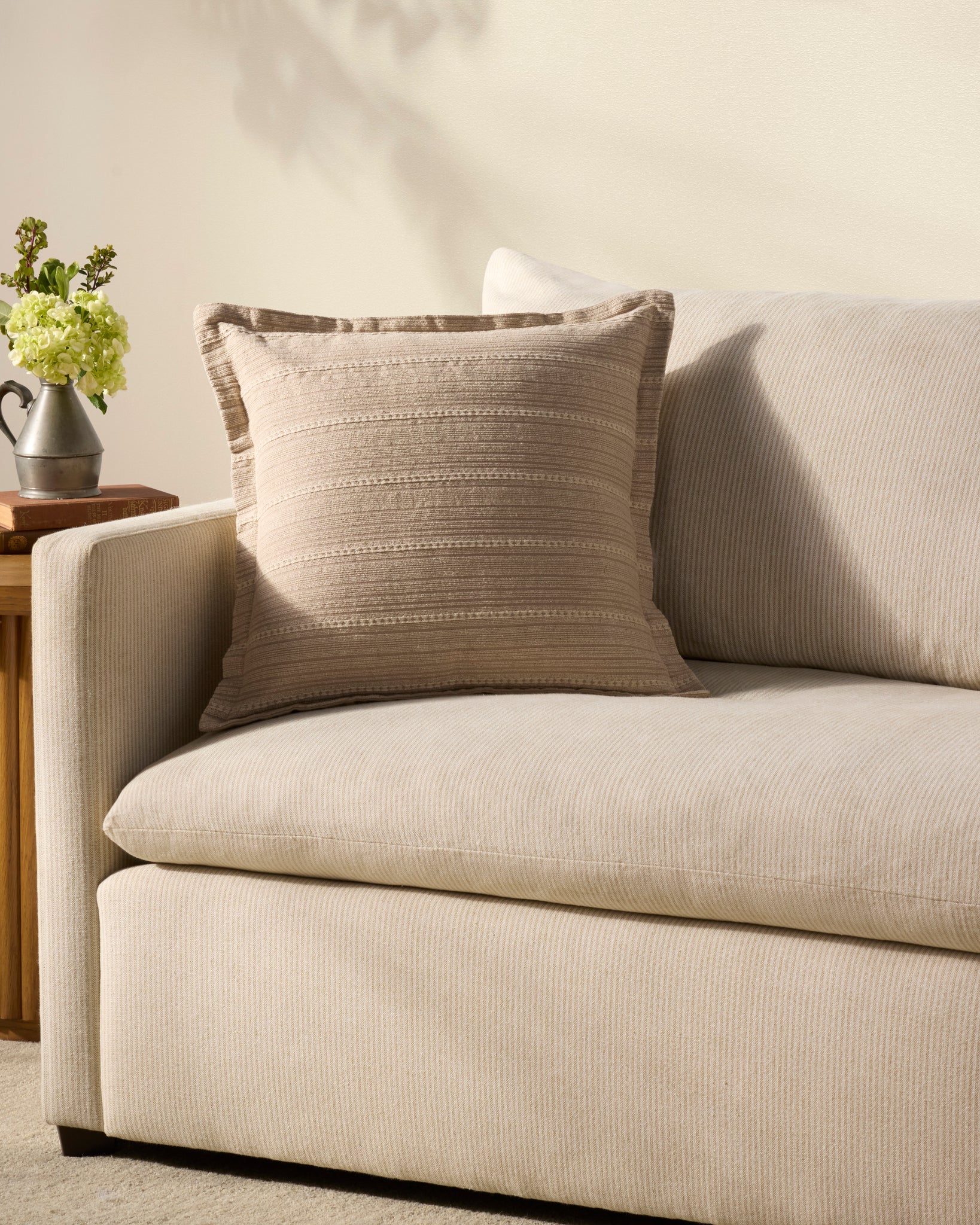Howie Natural Pillow shown from a different angle to reveal its pattern.