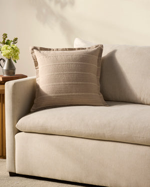 Howie Natural Pillow shown from a different angle to reveal its pattern.