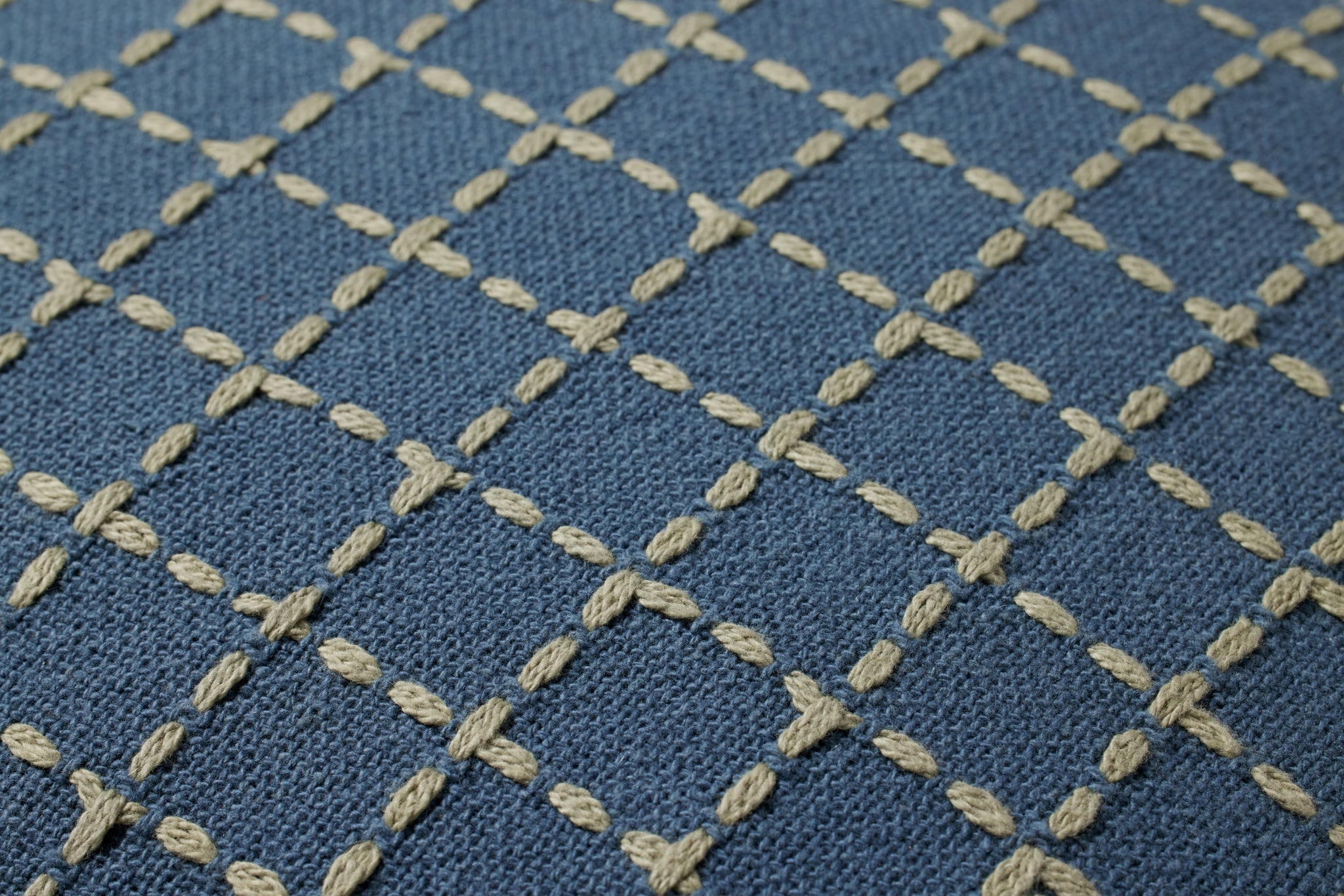 Blue / Green Pillow shown from a different angle to reveal its pattern.