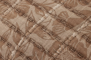 Cinnamon Pillow shown from a different angle to reveal its pattern.