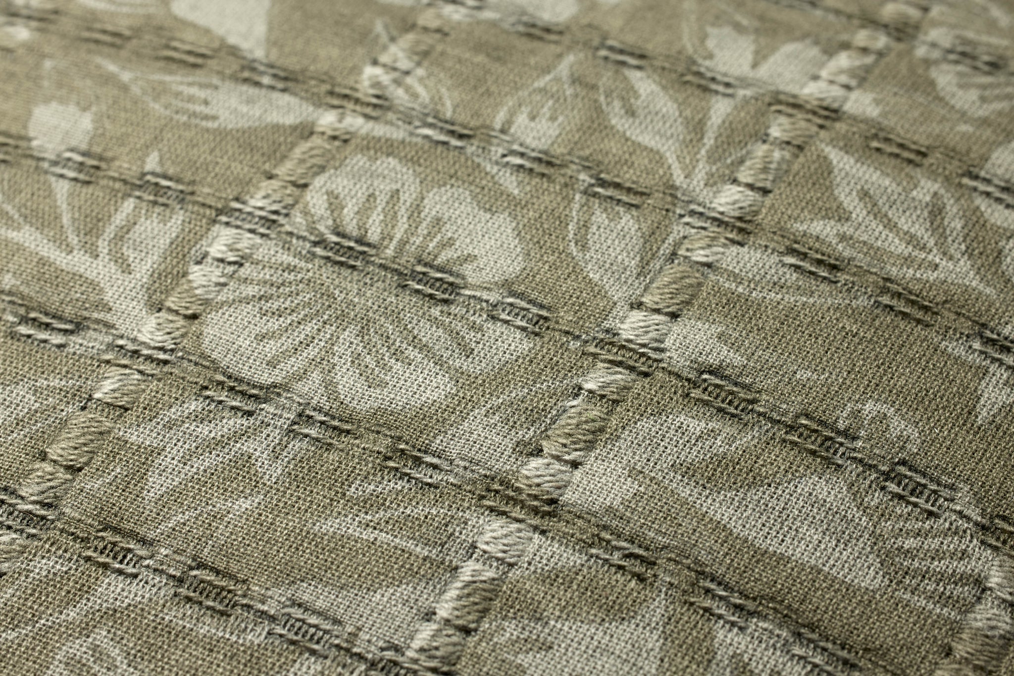 Green / Grey Pillow shown from a different angle to reveal its pattern.