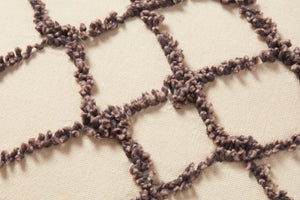 Ivory / Black Pillow (Pattern 2) shown from a different angle to reveal its pattern.